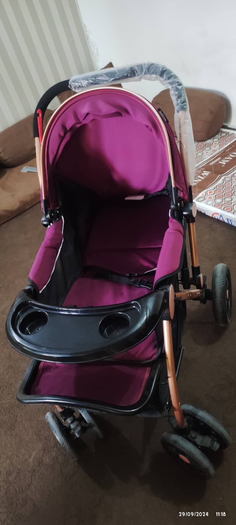 Two prams one in blue one in purple colour 7