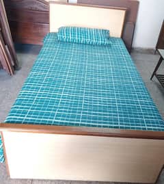 2 single beds with mattress