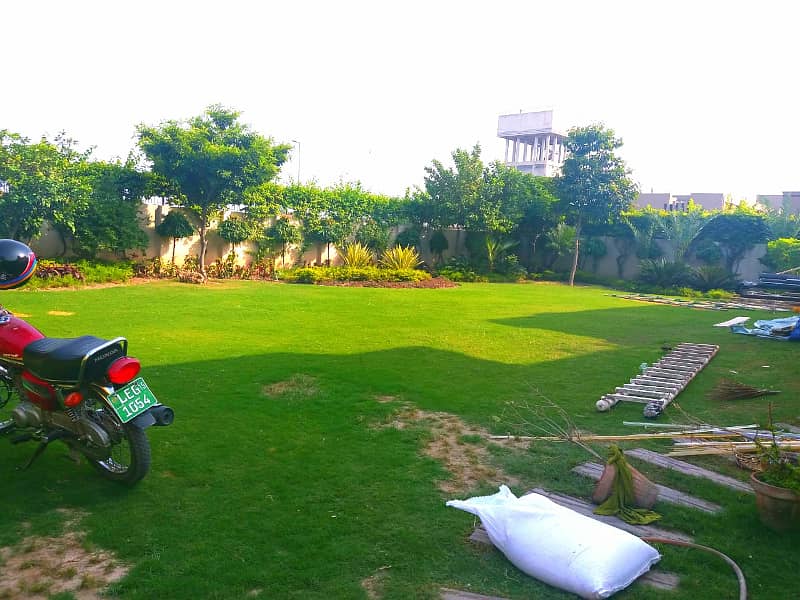 1 Kanal Like brand new Bungalow with 1kanal lush green lawn Available For Rent In DHA Phase 5 With Super Hot Location 1