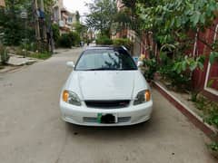 Honda Civic EXi Automatic 99 in good condition.