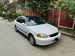 Honda Civic EXi Automatic 99 in good condition.