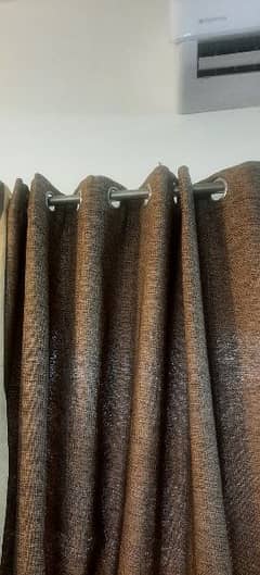 2 large dark brown curtains