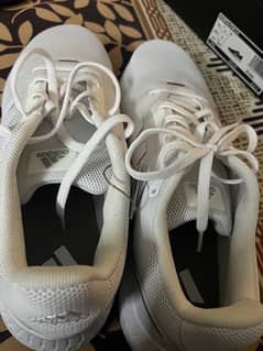 Addidas white sports shoes