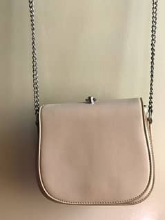 beige crossbody bag