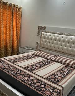 White Poshish bed with Golden Touch