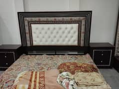 Wooden bed in sound condition up for sale