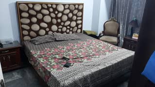 Wooden king size bed in good condition for sale