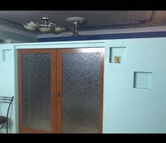 Sliding door with relling and water dispenser