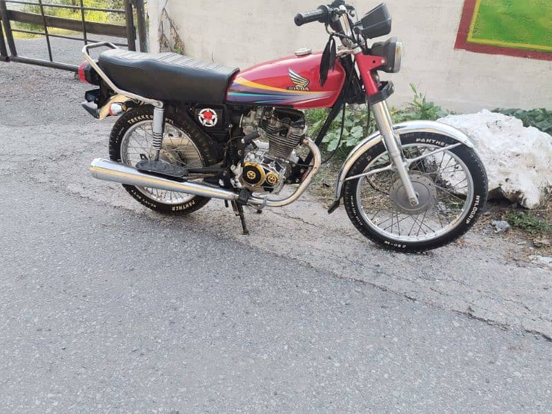 honda 125 red clr gldn nmb location balakot 5