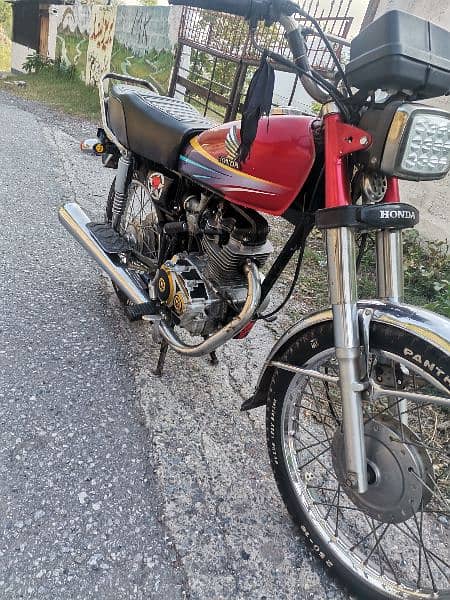 honda 125 red clr gldn nmb location balakot 7