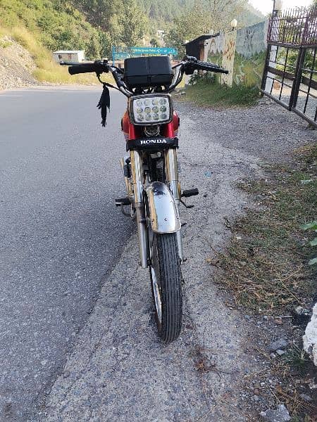 honda 125 red clr gldn nmb location balakot 8