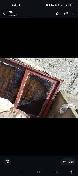 wood window with iron grill 3