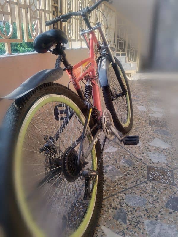 26 inch imported cycle for sale with double shocks, gears, disk brake 1