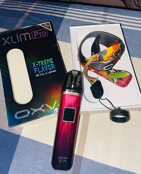 oxva xlim pro with lanyard and box 1