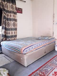 bed with spring mattress