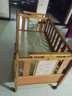 wooden baby cot