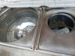 old metal body washing machine and dryer