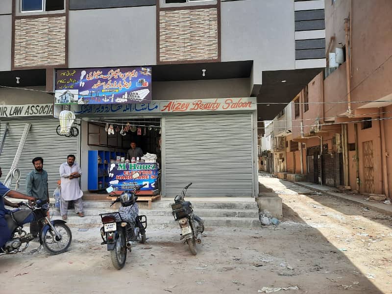 COMMERCIAL SHOP FOR RENT IN NEW BUILDING F. B AREA BLOCK 18 KARACHI 2