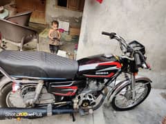 Honda 125cc saf condition red add