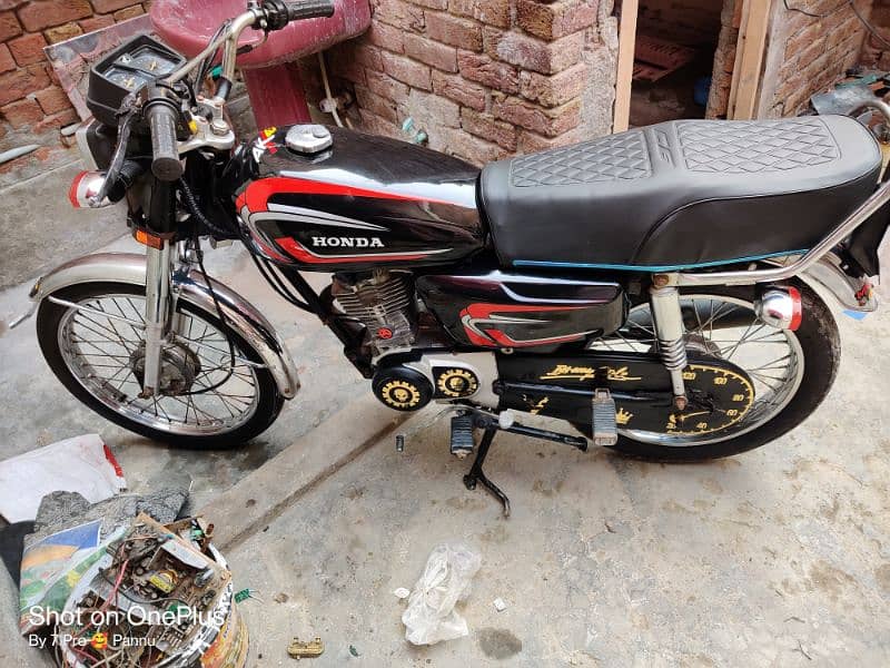 Honda 125cc saf condition red add 1