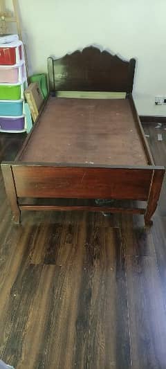 Two single sheesham wood beds with side tables