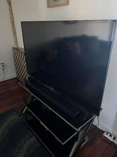 TCL 55" with box.