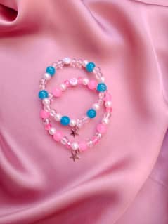 Aesthetic pink and blue matching braclets in unique style and colors