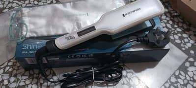 original Remington hair straightener. . model (shine therapy)