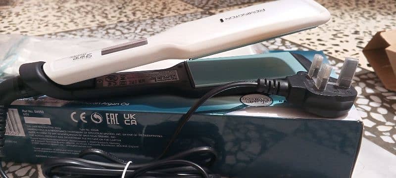 original Remington hair straightener. . model (shine therapy) 1