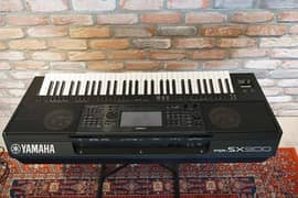 Yamaha psr sx900 with box and All Accessories.