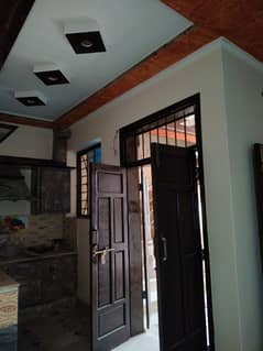 5 Marla house for sale with 2 shops pani bjli gas