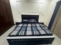 Brand New slightly used King Size Beautiful Bed with 2 side tables