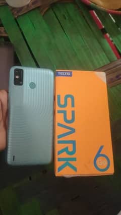 Tecno spark6. .  2/32 pta Approved box charger available