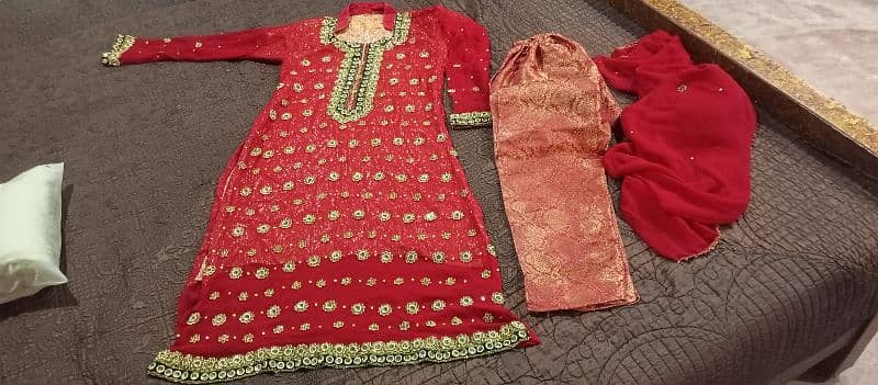 Three piece Dress one time used Medium size Mehroon colour just 3000, 0