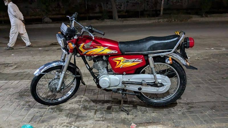 Honda 125  2021 modal hy lakin 2022 ma registration hy 4