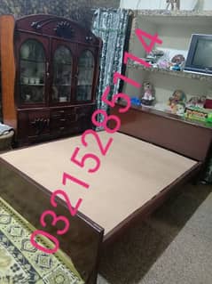 Double bed & showcase