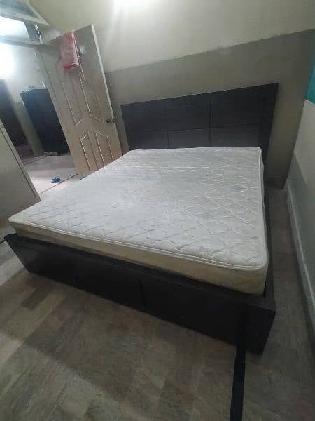 Fancy king size wooden bed along with victoria spring mattress 0