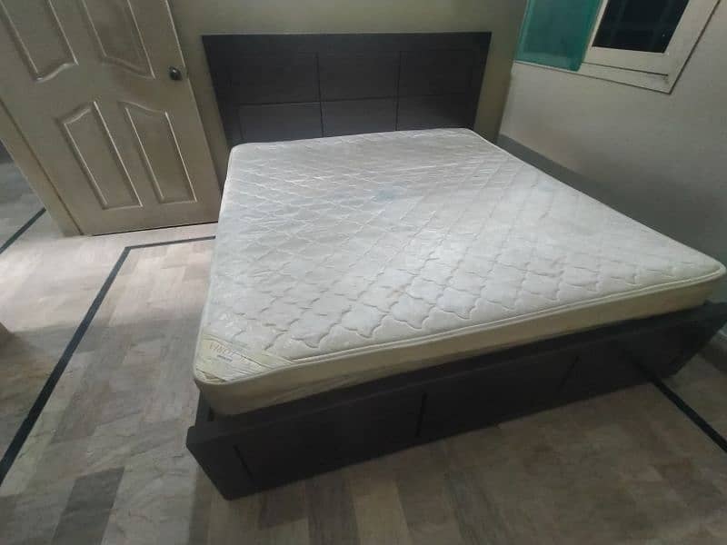 Fancy king size wooden bed along with victoria spring mattress 1