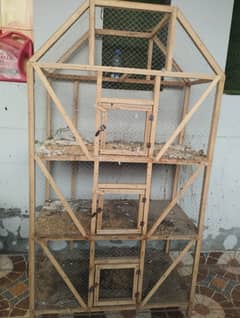 triple story wooden cage