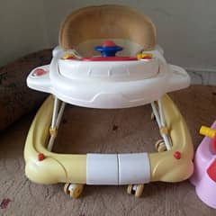 baby walker + rocker and potty seat