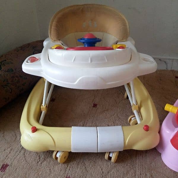 baby walker + rocker and potty seat 0