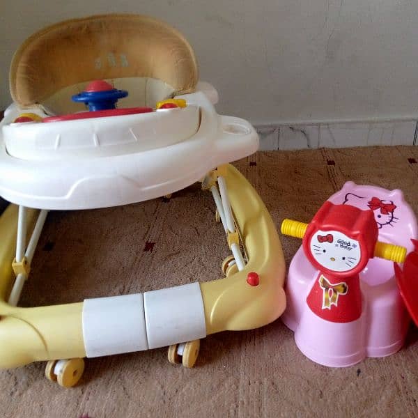 baby walker + rocker and potty seat 1