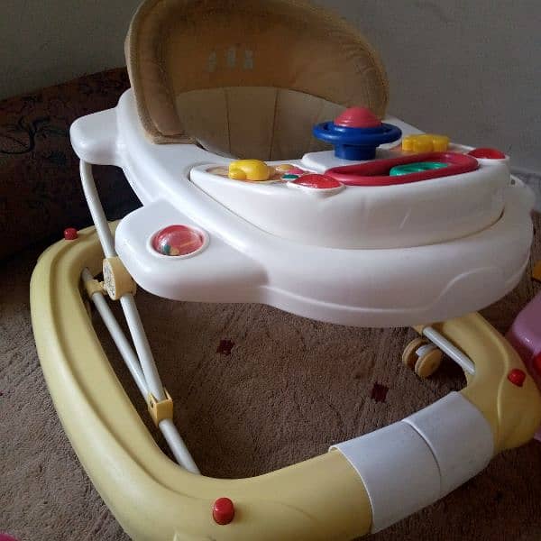 baby walker + rocker and potty seat 3