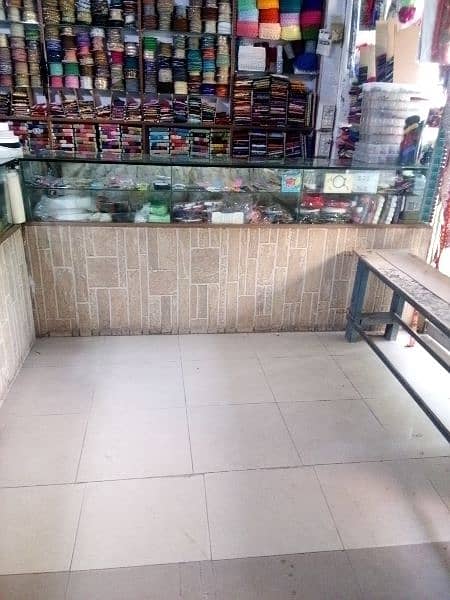 shop counter. . shop door full glass .  front shade steel made 3