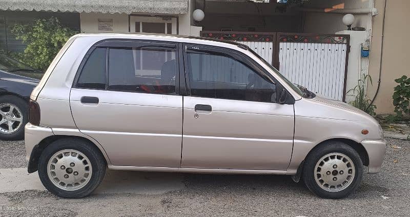 Daihatsu Cuore 2004 2