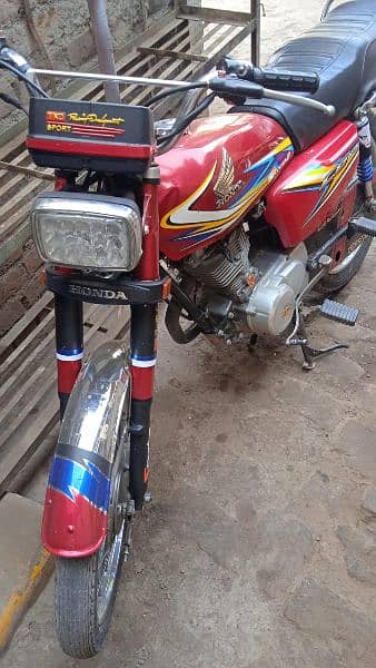 only whatsapp please 125 model 2019 red colour good condition 10/10 1