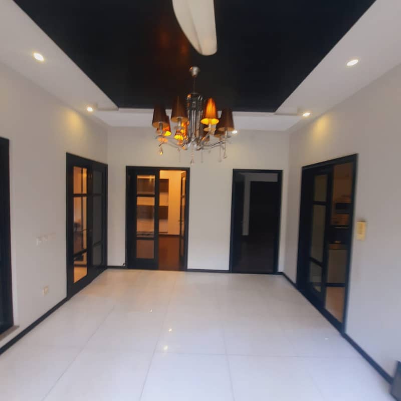 10 Marla House Brand New 4beds With Basement 2 TV Lounge Spanish Tiled Wooden Floors Available For Rent In DHA Phase 5 3