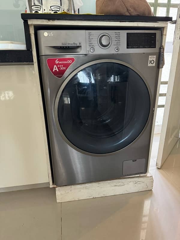 LG front load 10 kg washing Machine best in condition 1