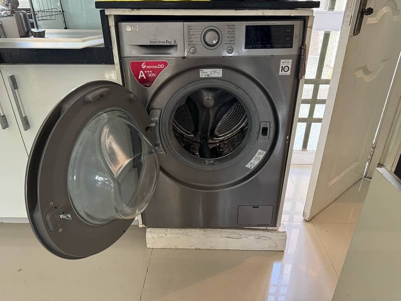 LG front load 10 kg washing Machine best in condition 3