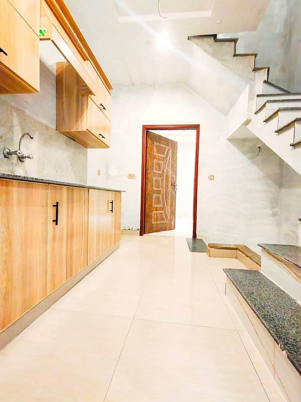 2 Marla Double Storey House For Sale Sheraz Town 3 Bedroom With Attached Washroom TV Lounge Tile Floorings Near Pcsir Staff Society College Road 10